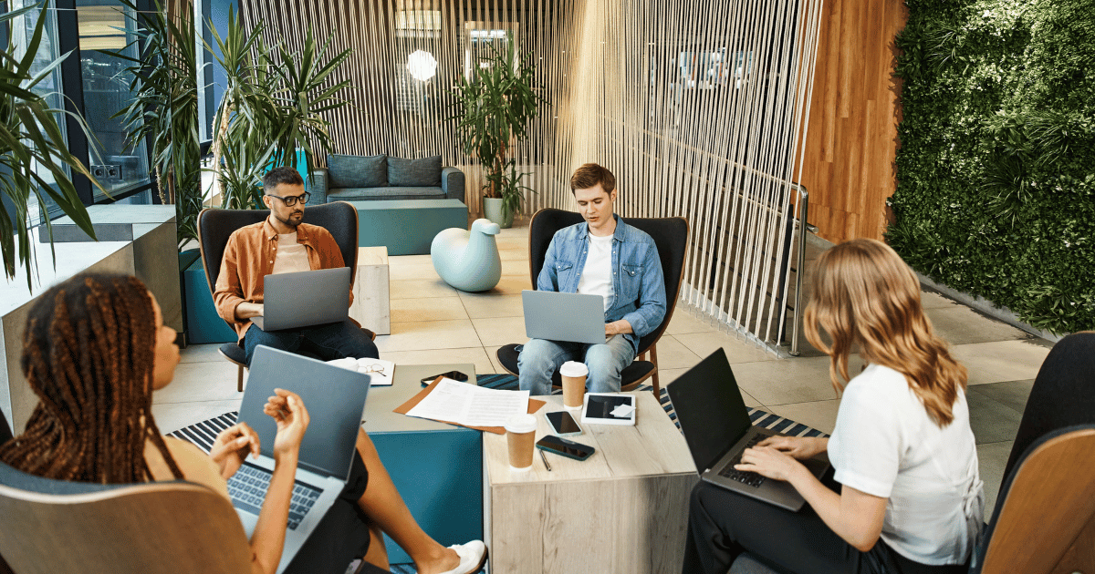 Professionals at Startup Sitting in Workspace