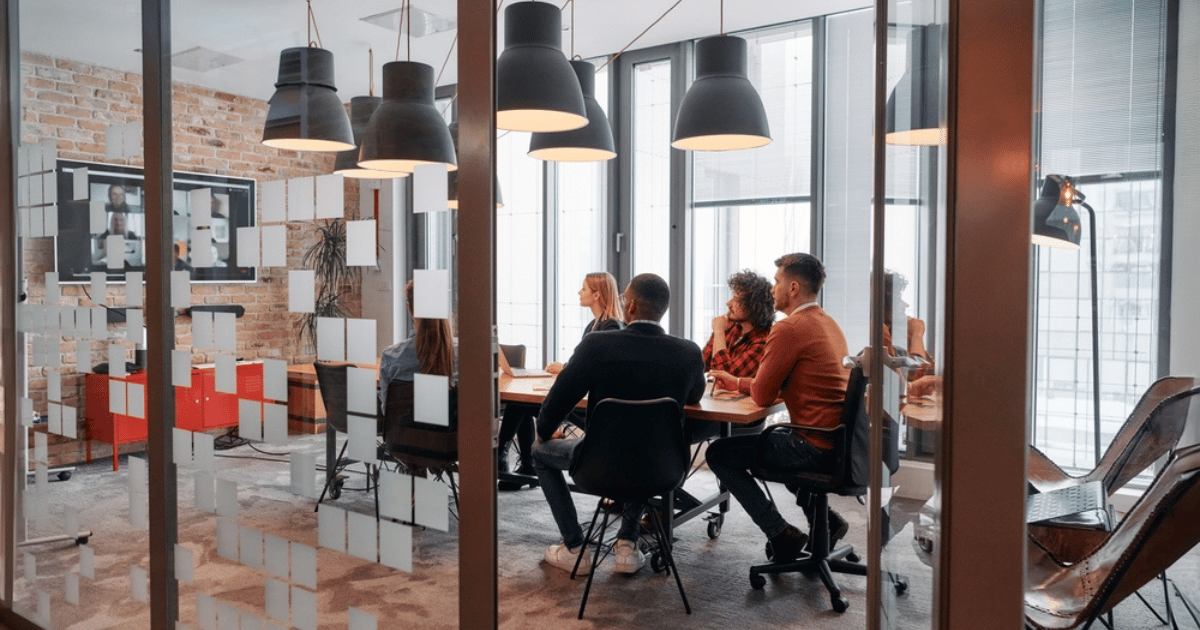 Business People in Board Room Collaborating